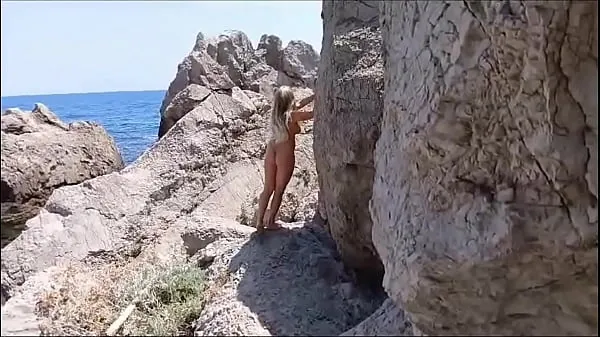 Deutsche Mutter nackt am Strand.